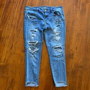**American Eagle Outfitters Superlow Jeggings distressed size 14